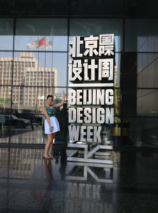 Melusine Boon Falleur poses in front of the Beijing Design Week office where she interned in August 2014