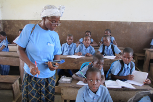 A government teacher in Liberia supported by Bridge